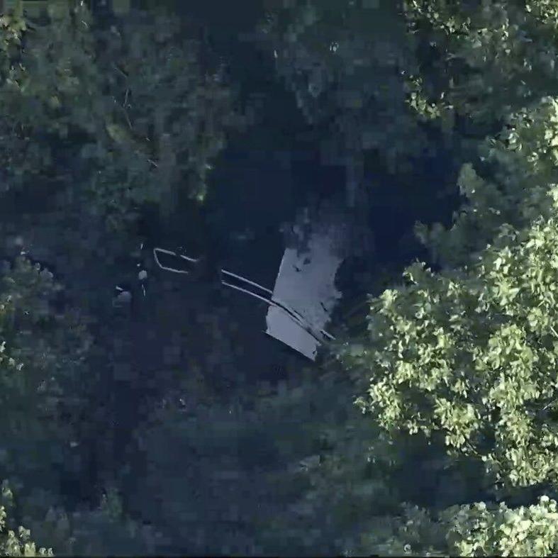 Skydiving plane goes off New Jersey runway and crashes into woods, sending 15 to hospital